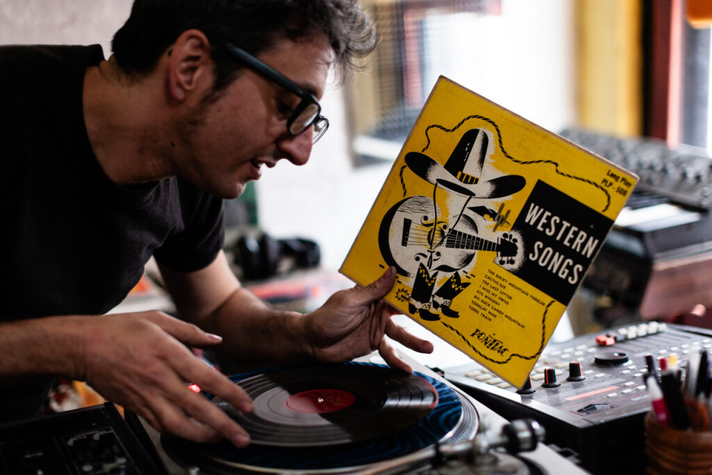 Matt Mikas, a vinyl record collector, photographed at his home in Brooklyn, NY for Dust & Grooves.