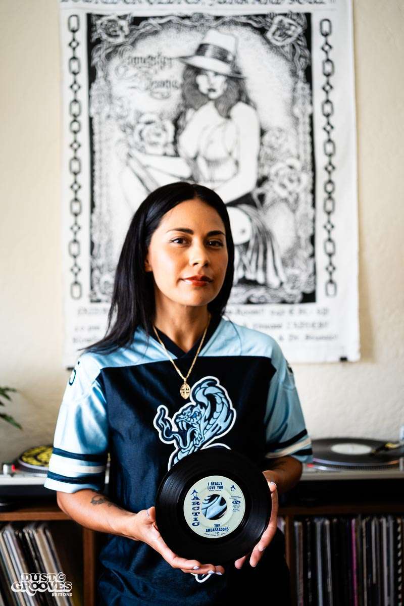 Melissa Dueñas, aka Sonrisita, a vinyl record collectors, photographed with her at her home in Los Angeles, CA for Dust & Grooves Volume 2 book.