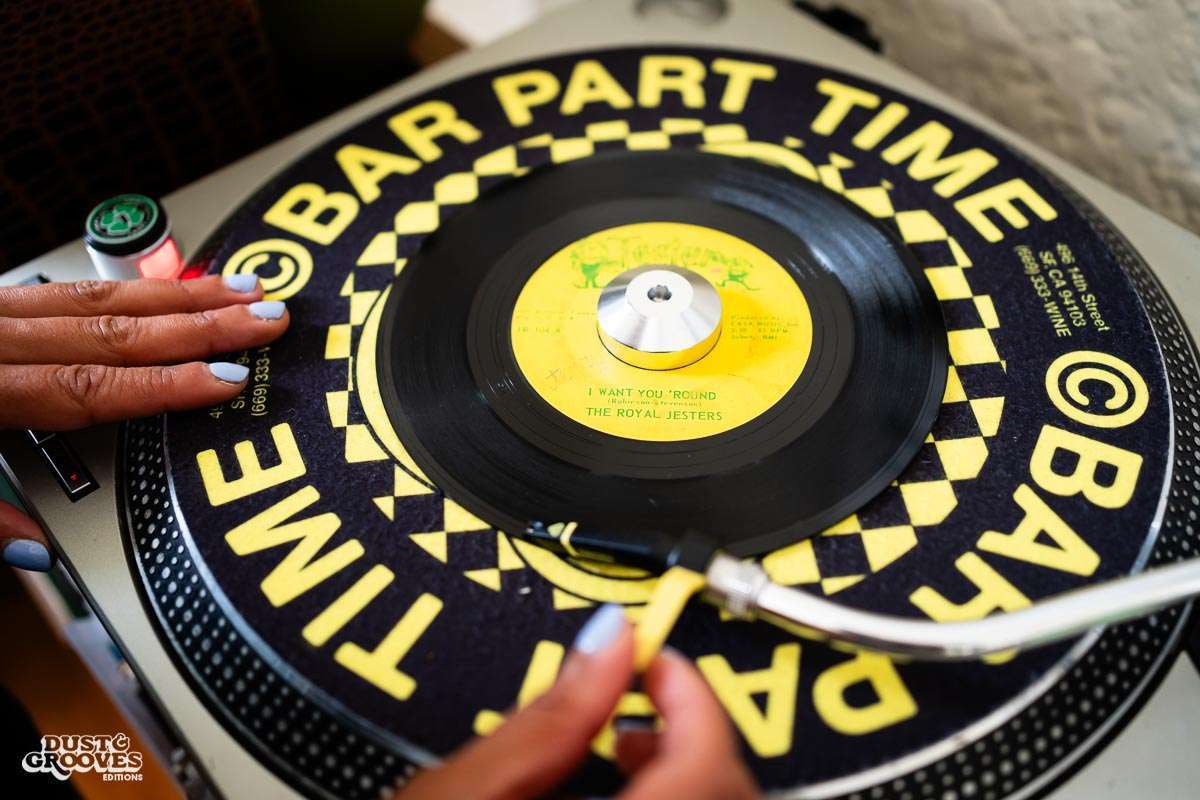 Melissa Dueñas, aka Sonrisita, a vinyl record collectors, photographed with her at her home in Los Angeles, CA for Dust & Grooves Volume 2 book.