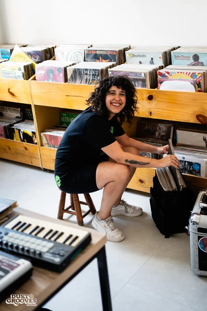Rafa Jazz, record collector, DJ, and music producer, photographed at her house with her vinyl record collection in São Paulo, Brazil for Dust & Grooves Volume 2 book.
