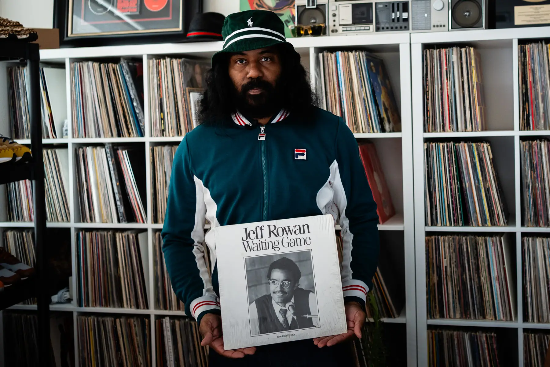 DaM FunK, music producer, recording artist, and vinyl record collector, photographed at his house in Los Angeles, CA with his vinyl record collection for Dust & Grooves Vol.2