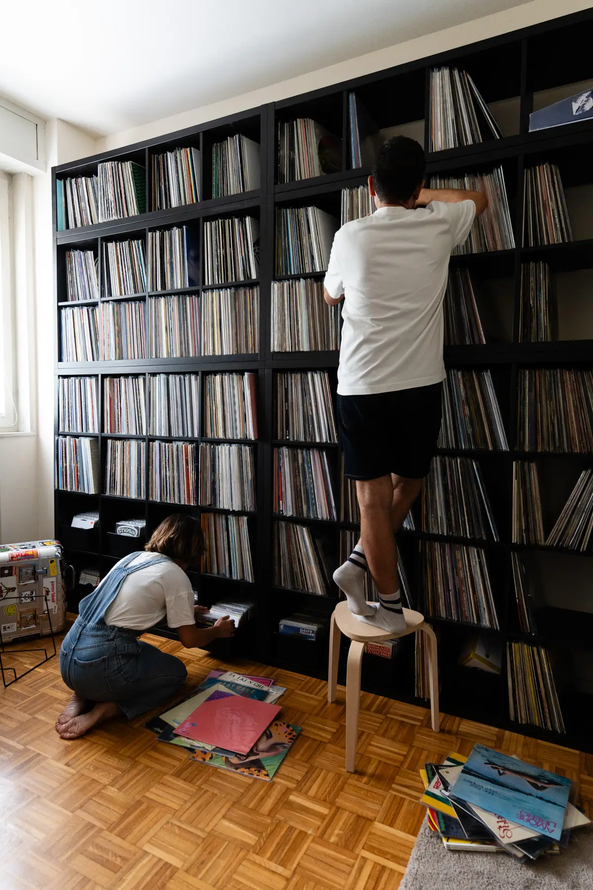 Giovanna Fiorentino & Valerio Iuliano, also known as the DJ duo Raregems, photographed at their house in Parma, Italy with their vinyl record collection for Dust & Grooves Volume 2 book.