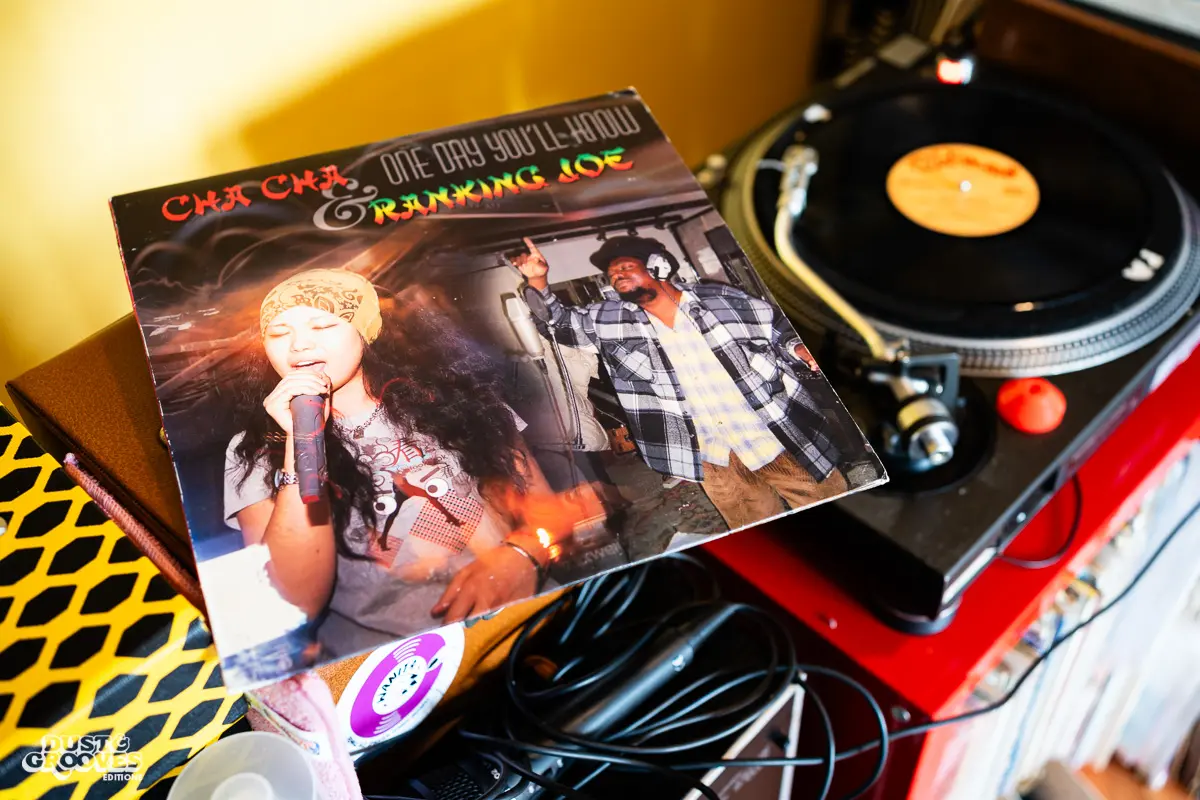 Zoë Baxter, AKA Lucky Cat Zoë, photographed at her London apartment, with her East Asian and Reggae vinyl record collection for Dust & Grooves Volume 2 book.