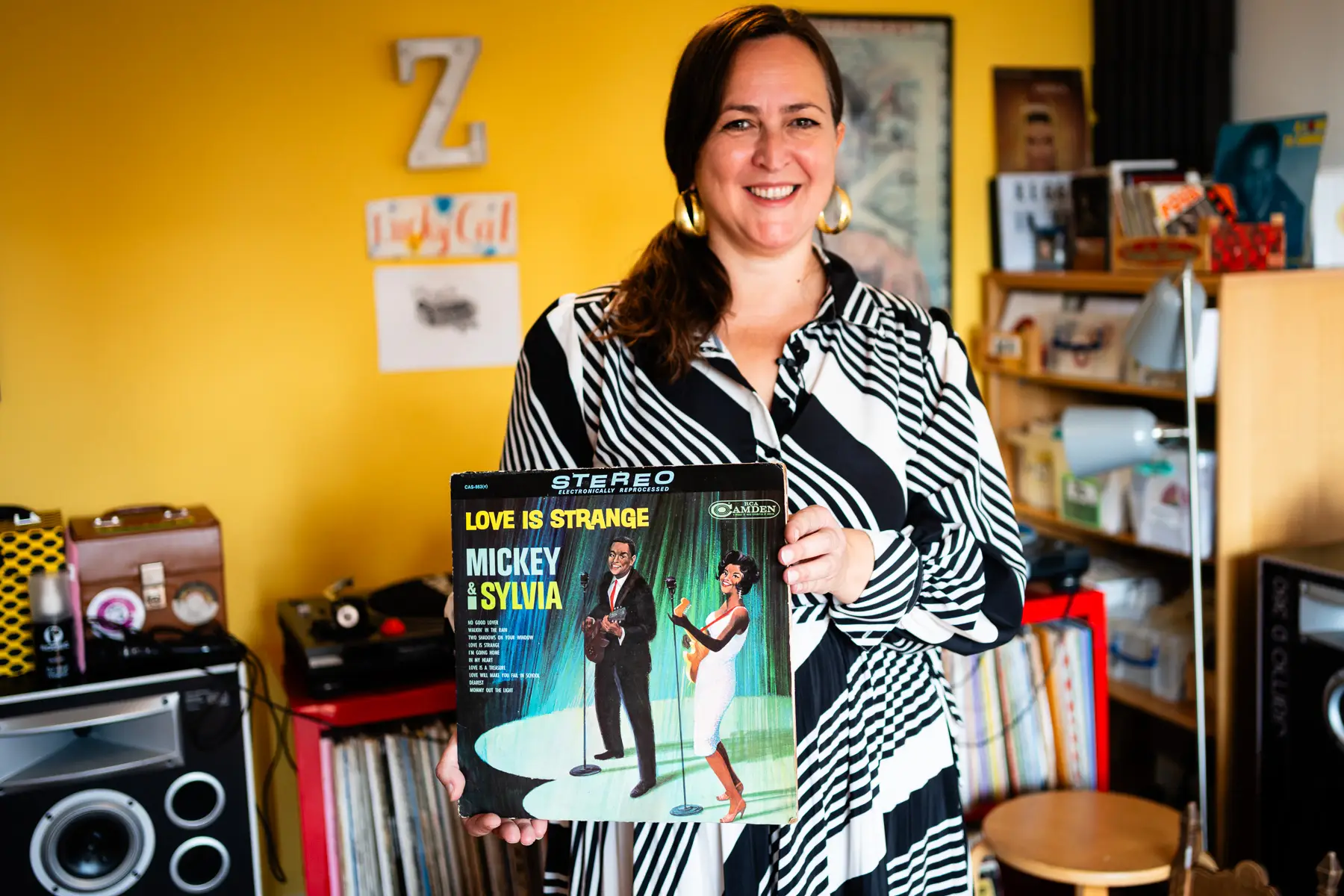 Zoë Baxter, AKA Lucky Cat Zoë, photographed at her London apartment, with her East Asian and Reggae vinyl record collection for Dust & Grooves Volume 2 book.
