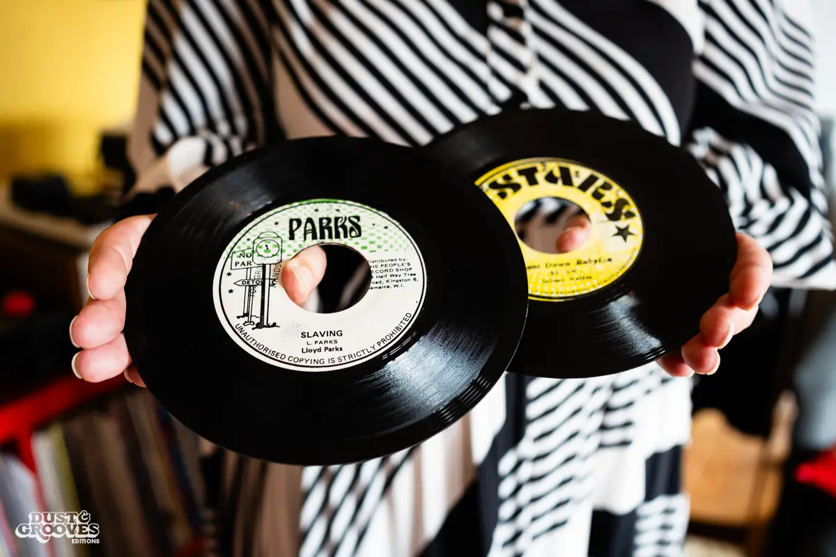 Zoë Baxter, AKA Lucky Cat Zoë, photographed at her London apartment, with her East Asian and Reggae vinyl record collection for Dust & Grooves Volume 2 book.