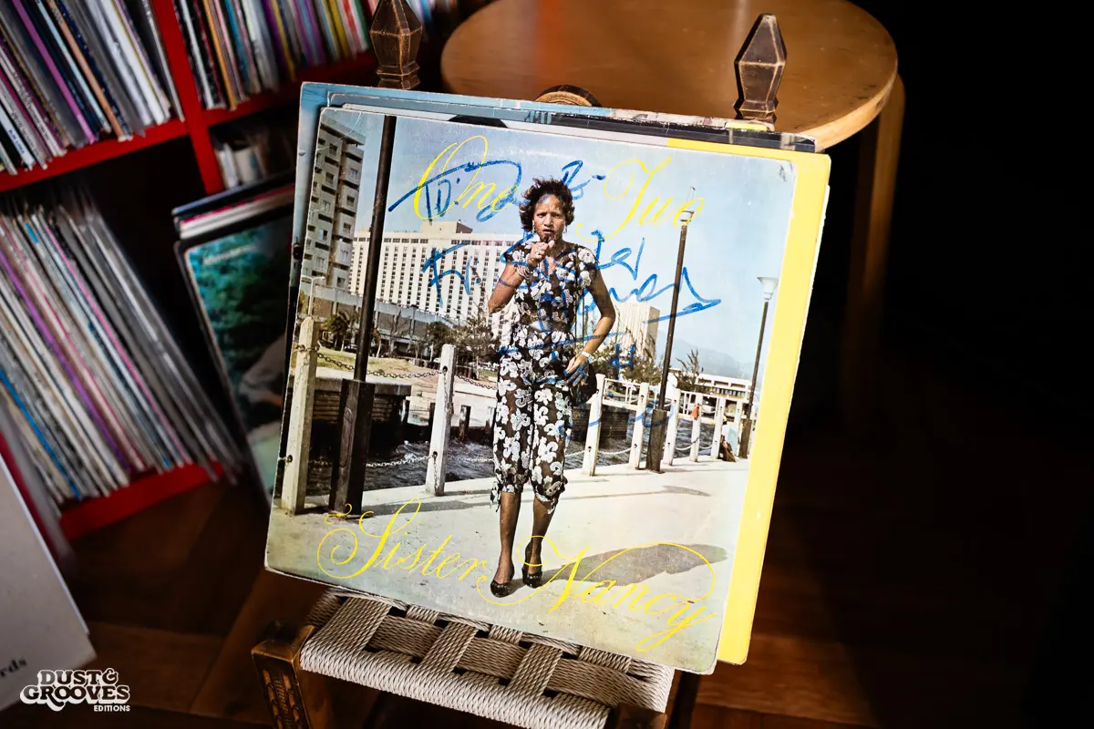 Zoë Baxter, AKA Lucky Cat Zoë, photographed at her London apartment, with her East Asian and Reggae vinyl record collection for Dust & Grooves Volume 2 book.