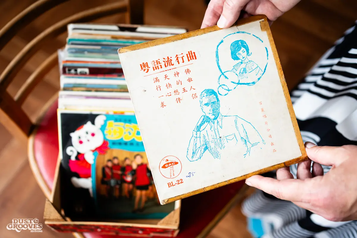 Zoë Baxter, AKA Lucky Cat Zoë, photographed at her London apartment, with her East Asian and Reggae vinyl record collection for Dust & Grooves Volume 2 book.