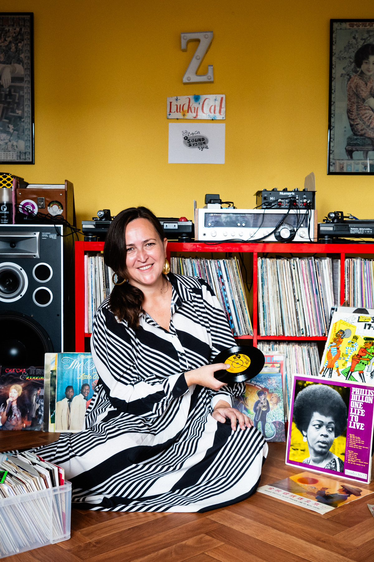 Zoe Baxter, AKA Lucky Cat Zoe, photographed at her London apartment, with her East Asian and Reggae vinyl record collection for Dust & Grooves Volume 2 book.