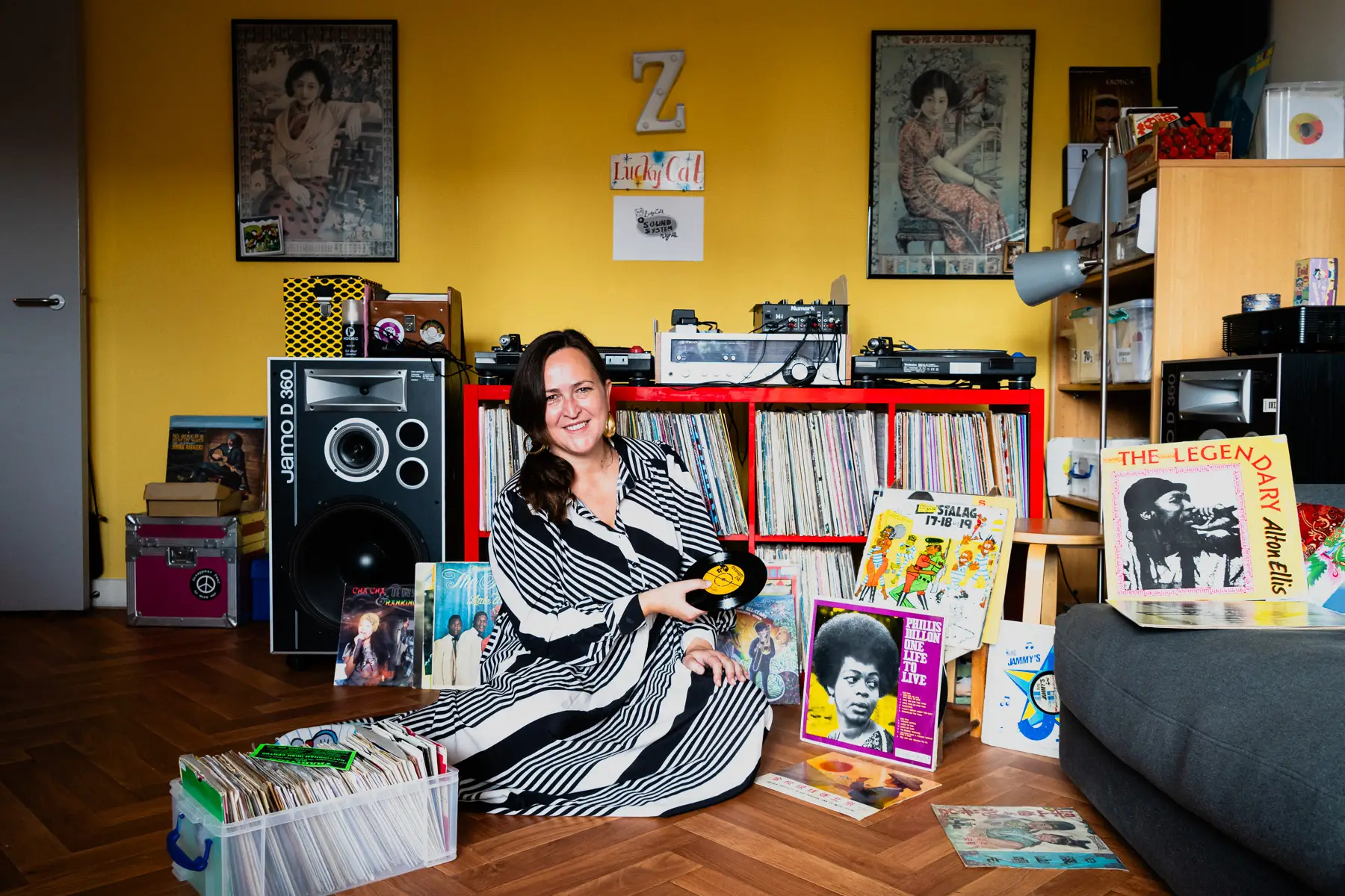 Zoe Baxter, AKA Lucky Cat Zoe, photographed at her London apartment, with her East Asian and Reggae vinyl record collection for Dust & Grooves Volume 2 book.