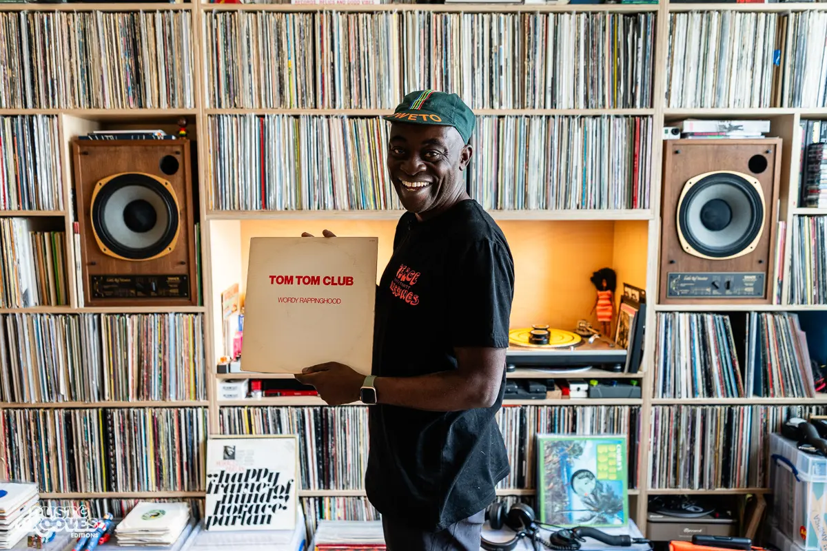 Charlie Dark, DJ, coach, and founder of Run Dem Crew, photographed at his London apartment, with his vinyl record collection for Dust & Grooves Volume 2 book.