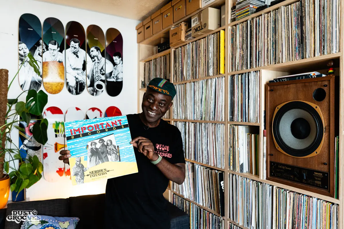 Charlie Dark, DJ, coach, and founder of Run Dem Crew, photographed at his London apartment, with his vinyl record collection for Dust & Grooves Volume 2 book.