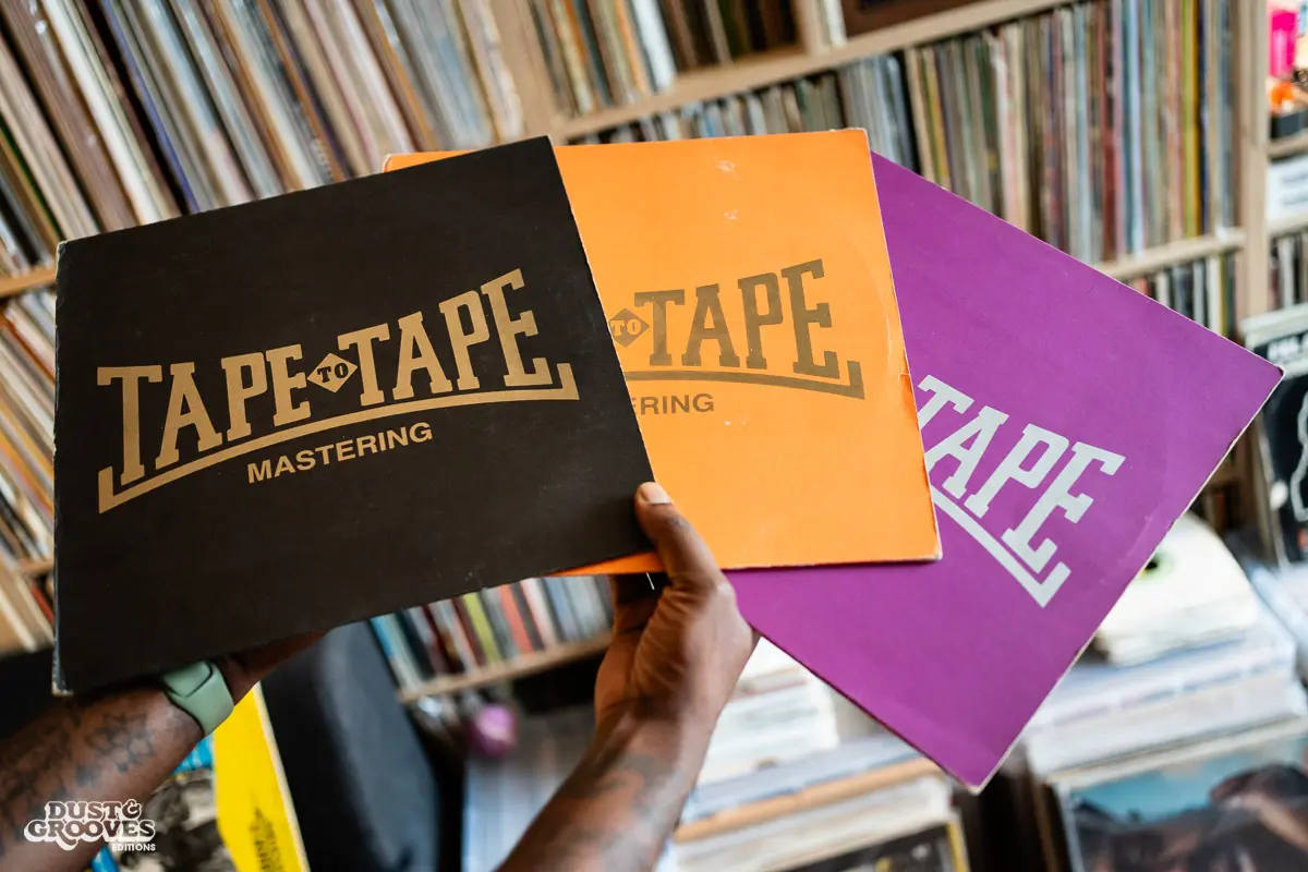 Charlie Dark, DJ, coach, and founder of Run Dem Crew, photographed at his London apartment, with his vinyl record collection for Dust & Grooves Volume 2 book.