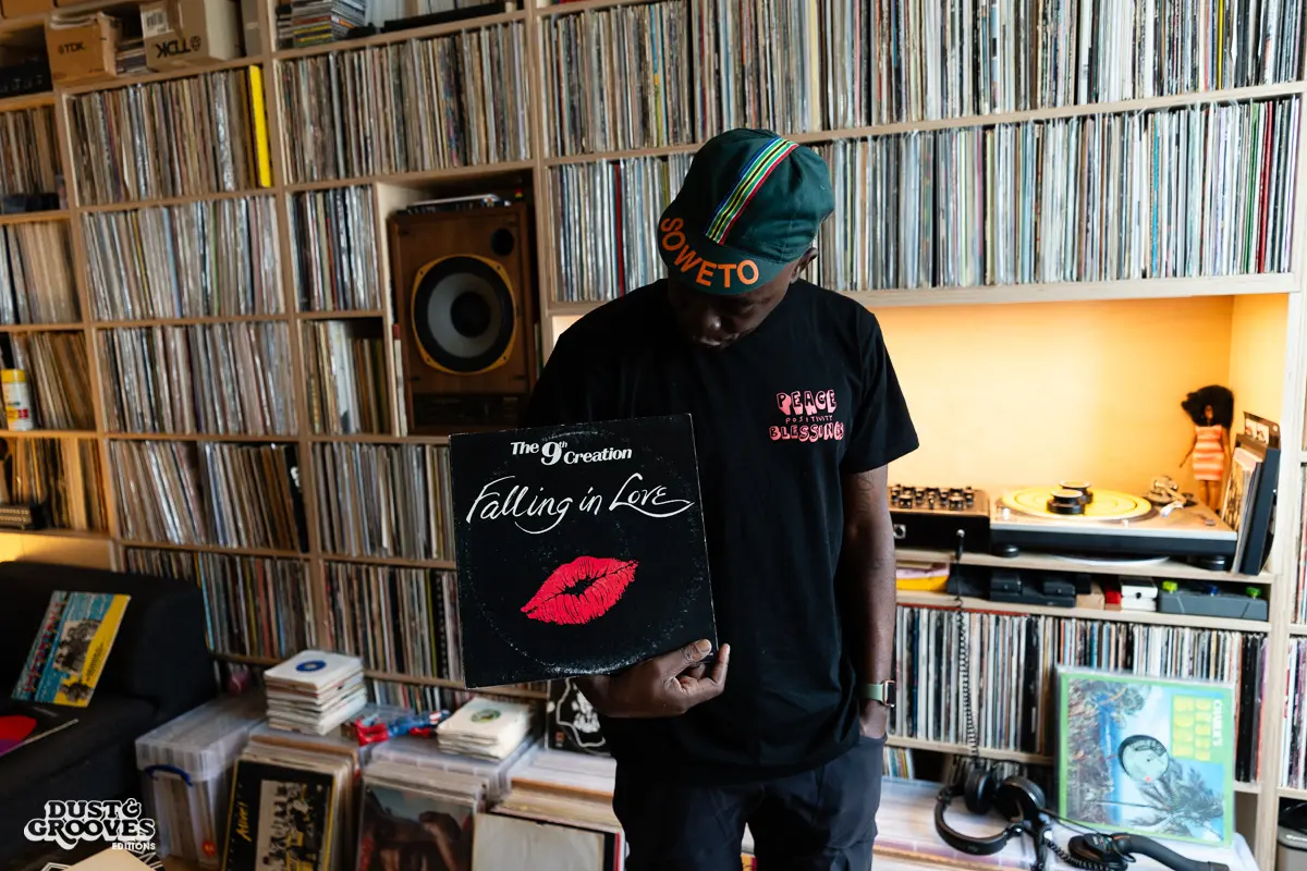 Charlie Dark, DJ, coach, and founder of Run Dem Crew, photographed at his London apartment, with his vinyl record collection for Dust & Grooves Volume 2 book.