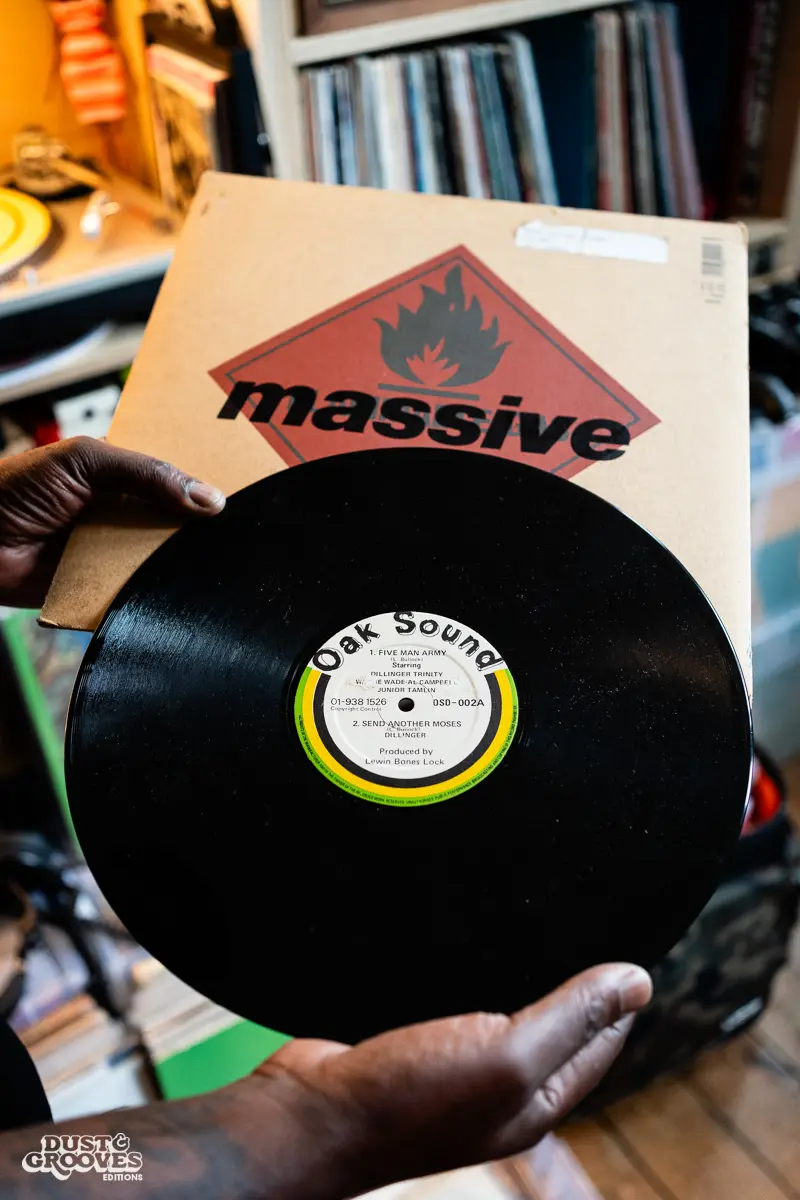 Charlie Dark, DJ, coach, and founder of Run Dem Crew, photographed at his London apartment, with his vinyl record collection for Dust & Grooves Volume 2 book.