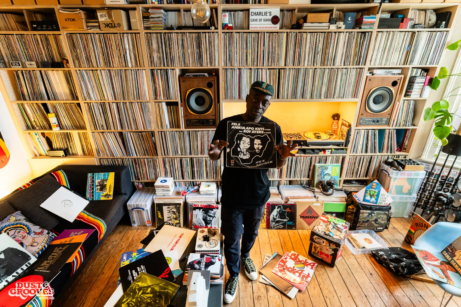 Charlie Dark, DJ, coach, and founder of Run Dem Crew, photographed at his London apartment, with his vinyl record collection for Dust & Grooves Volume 2 book.