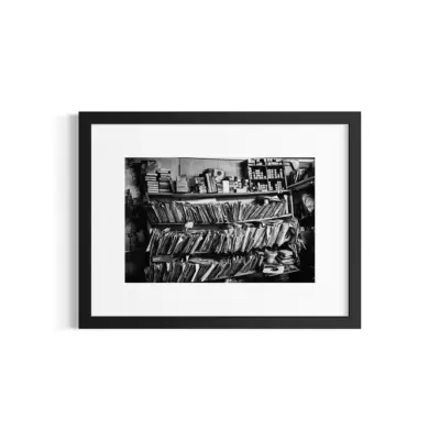 Aikei Pro's Record Shop. Holly Springs, MS. Mr. Caldwell’s Aikei Pro’s has to be experienced to be believed. It took a solid hour just to clear away enough boxes and debris to allow cramped entrance to the store. The shelves are stuffed with musty records and old mail, and various posters hang from the rafters. Stashed next to some LPs by the door is an old handgun wrapped in a plastic bag. He may be old, but Mr. Caldwell is still sharp as a tack.