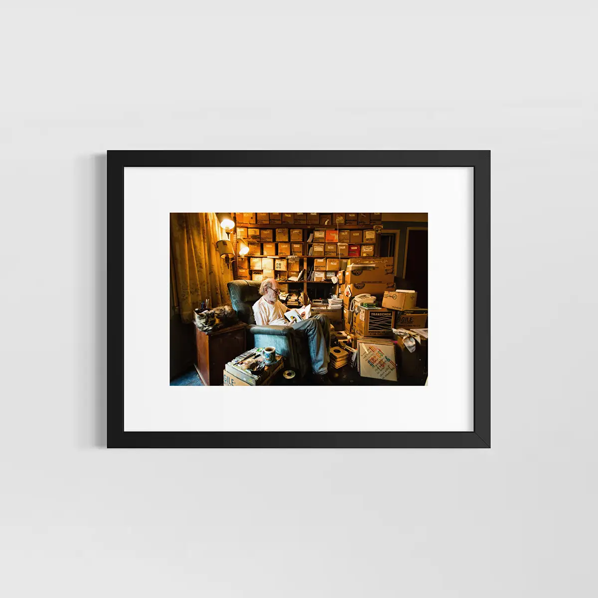 Bob Mays. Detroit, MI. The legendary record dealer at home rifling through his favorite hillbilly 7-inches.