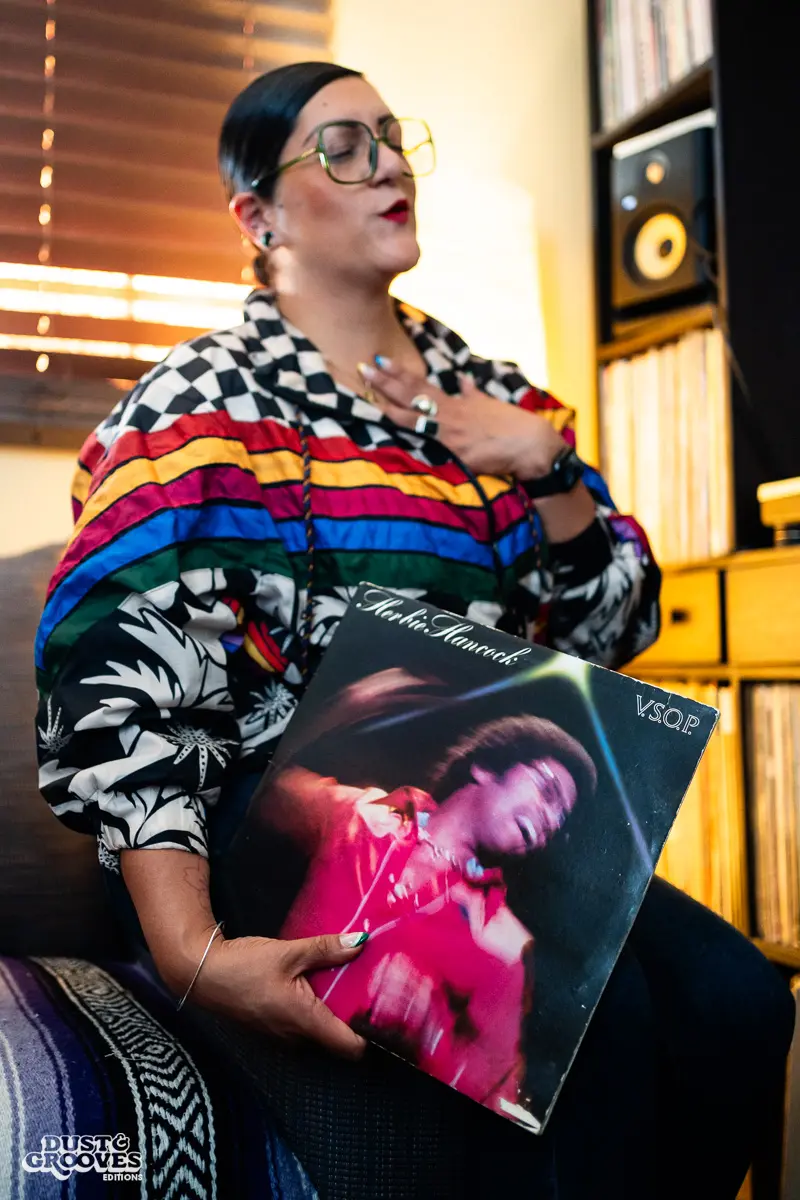 Rocio “Wyldeflower” Contreras, a Los Angeles–based DJ, record collector, and KCRW radio host, photographed at her LA home with her record collection for Dust & Grooves Volume 2.