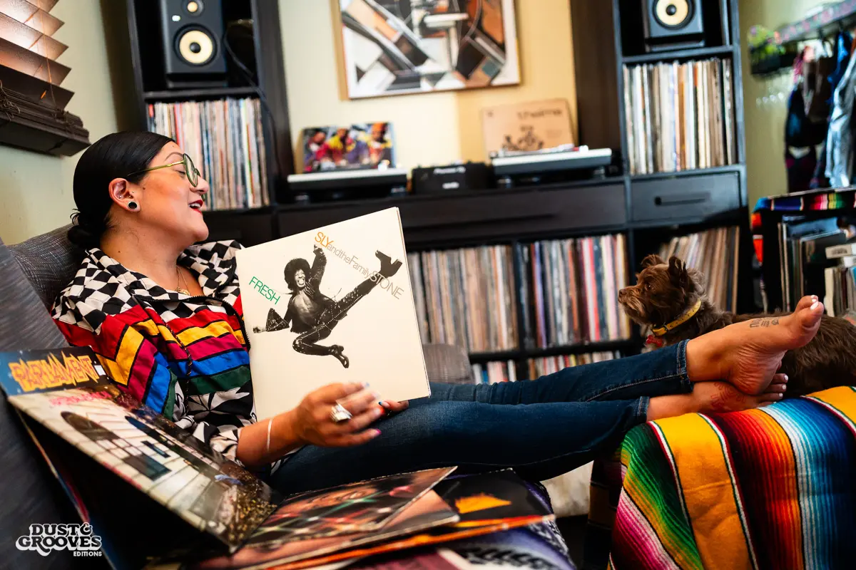 Rocio “Wyldeflower” Contreras, a Los Angeles–based DJ, record collector, and KCRW radio host, photographed at her LA home with her record collection for Dust & Grooves Volume 2.