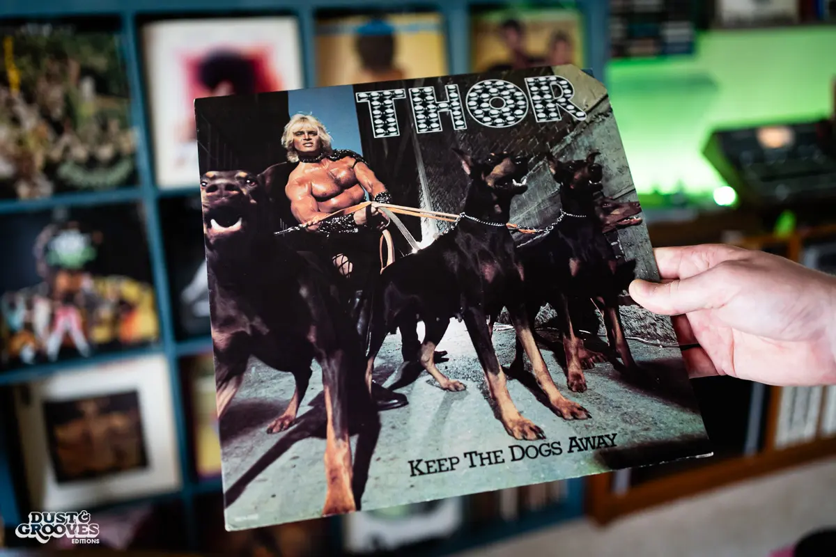 DJ Platurn, a music producer and vinyl record collector, is pictured in his Vallejo, CA home with shelves of vinyl and personal music memorabilia for Dust & Grooves Volume 2. 