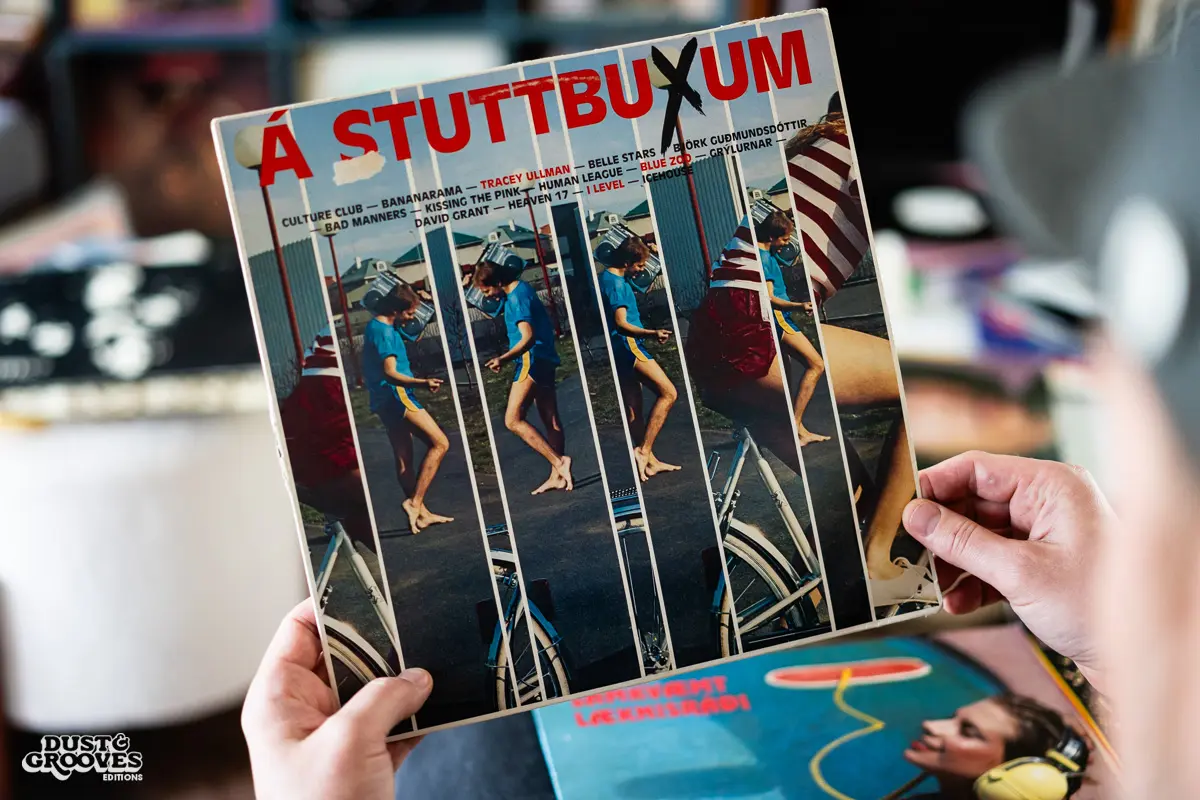 DJ Platurn, a music producer and vinyl record collector, is pictured in his Vallejo, CA home with shelves of vinyl and personal music memorabilia for Dust & Grooves Volume 2. 