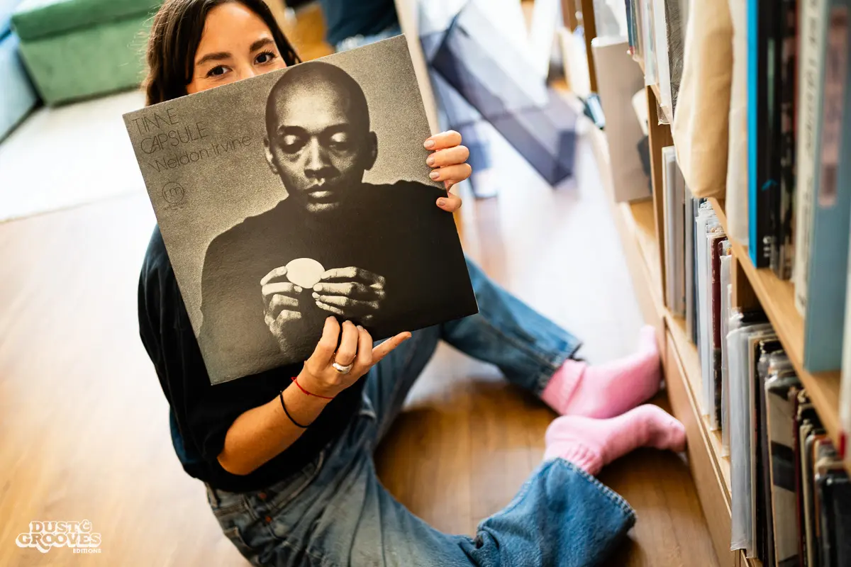 Louise Chen, DJ and vinyl record collector, is pictured at her Parisian apartment with shelves of vinyl records for Dust & Grooves Volume 2. 