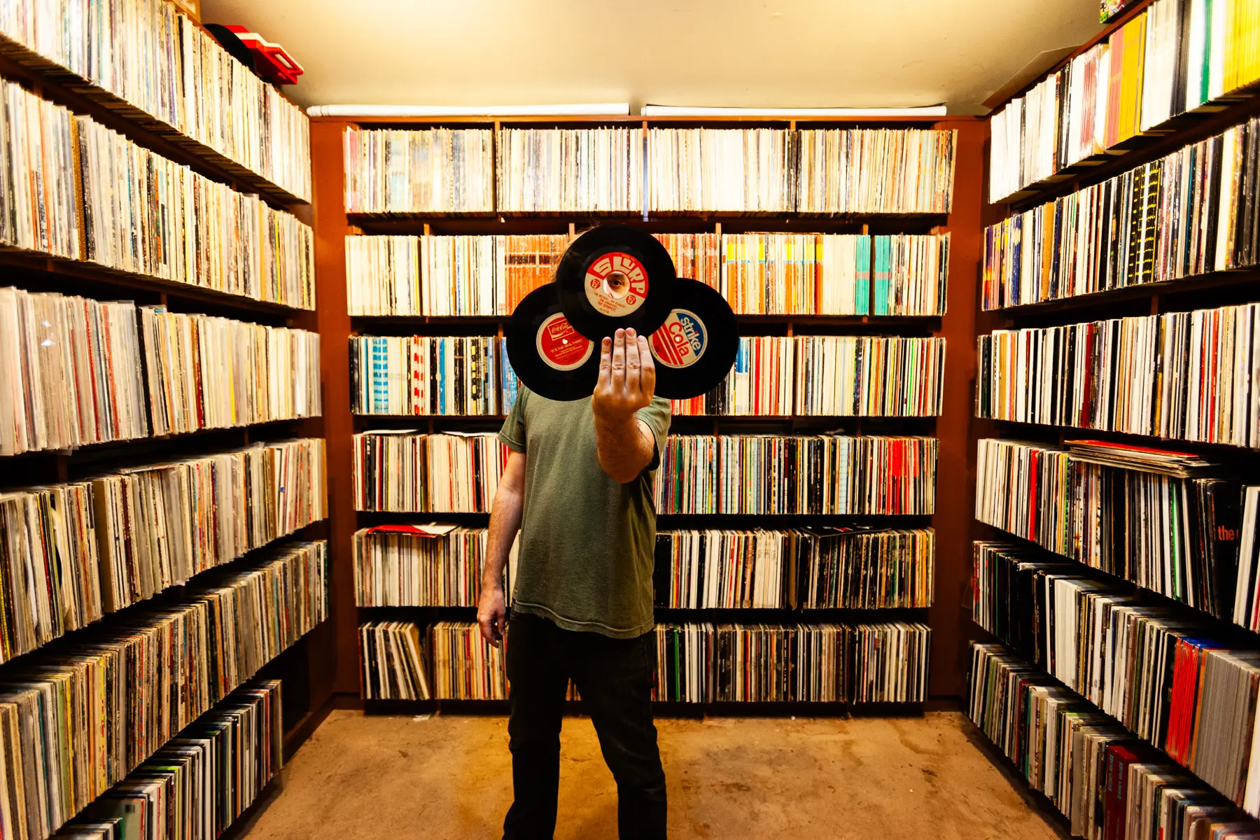 Cut Chemist, AKA Lucas McFadden, Music producer, recording artist and a vinyl record collector, is pictured in home studio in Los Angeles with his collection, photographed for Dust & Grooves Vol. 1.